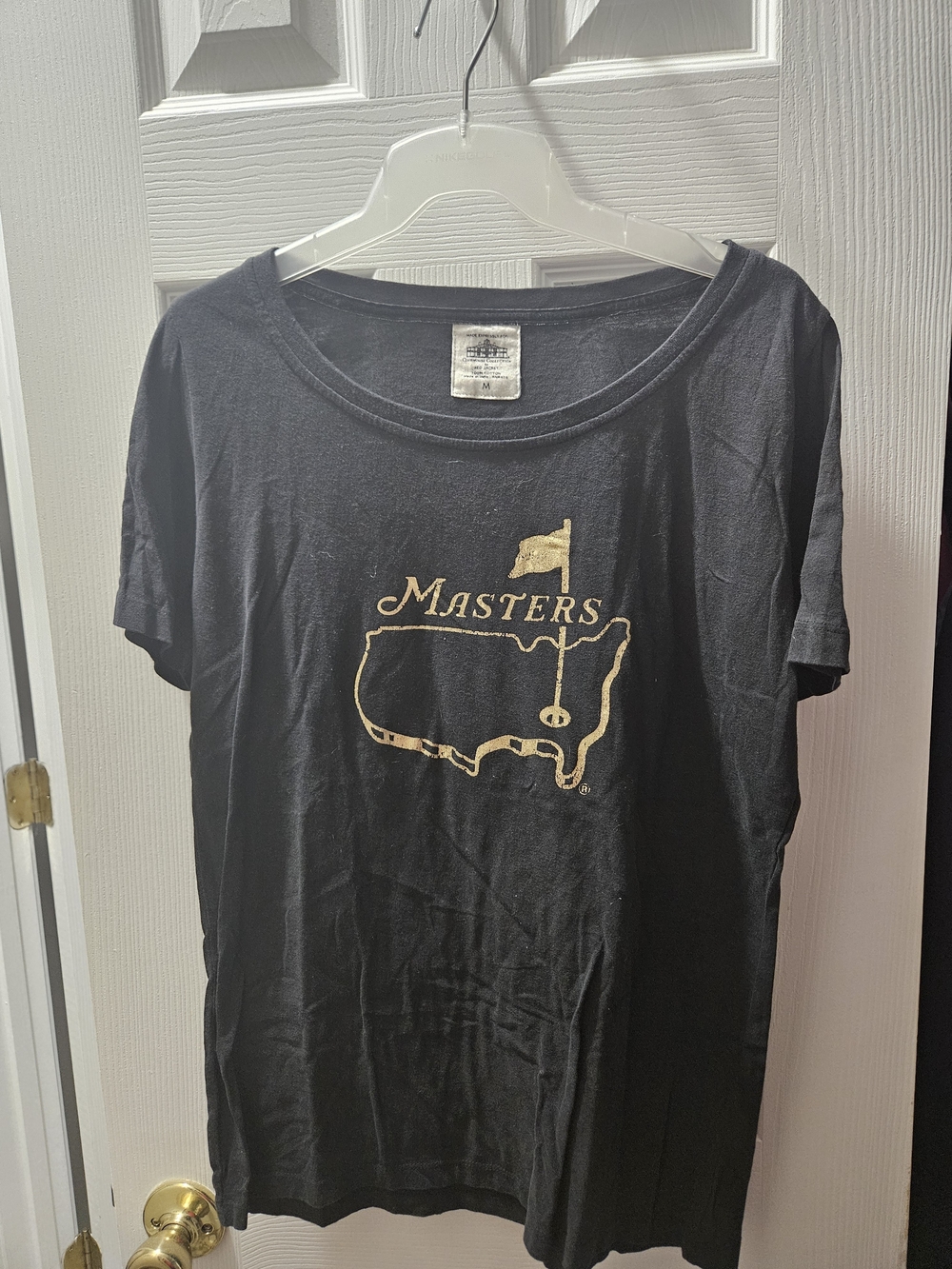 Red Jacket Black T‑Shirt with Gold Masters Graphic